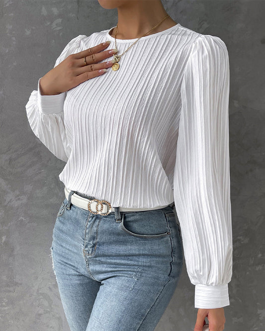 Blouse romantique à manches bouffantes élégante et féminine