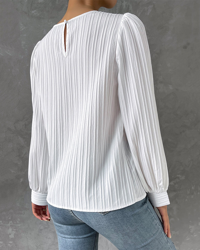 Blouse romantique à manches bouffantes élégante et féminine
