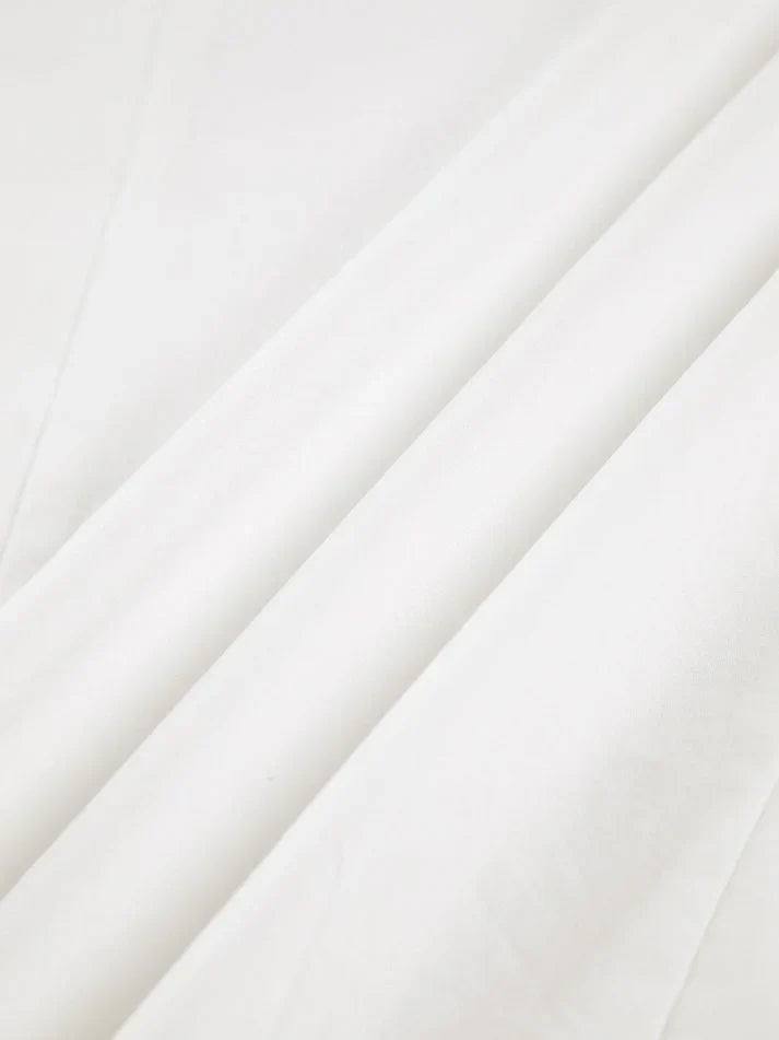 Chemise large au design épuré pour un look professionnel élégant