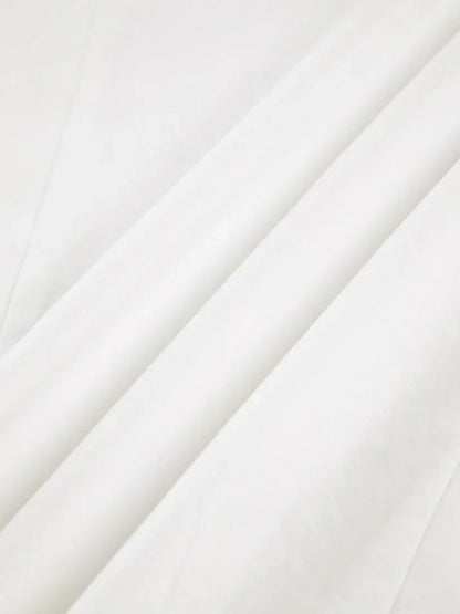 Chemise large au design épuré pour un look professionnel élégant
