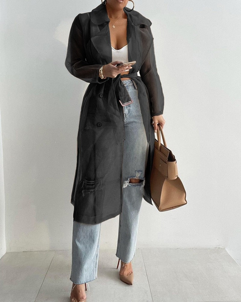 Trench long transparent ceinturé femme élégant et stylé