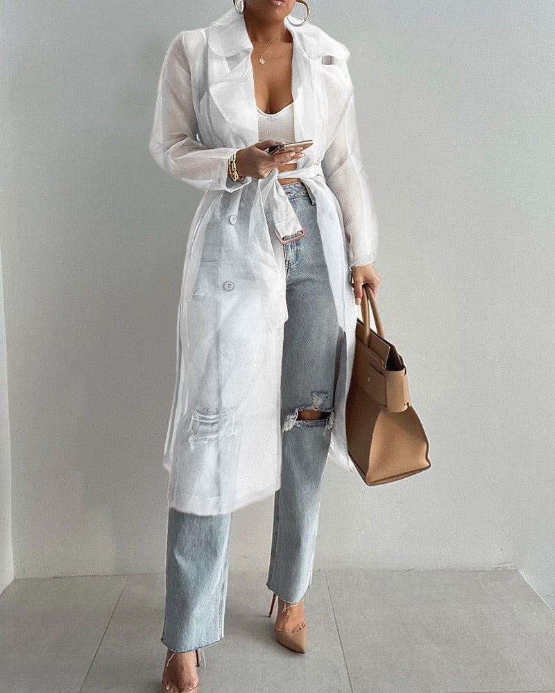 Trench long transparent ceinturé femme élégant et stylé