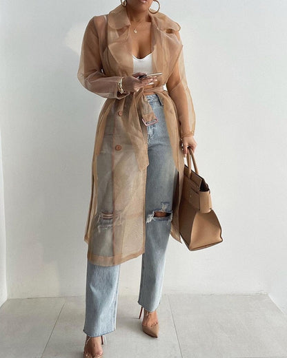 Trench long transparent ceinturé femme élégant et stylé