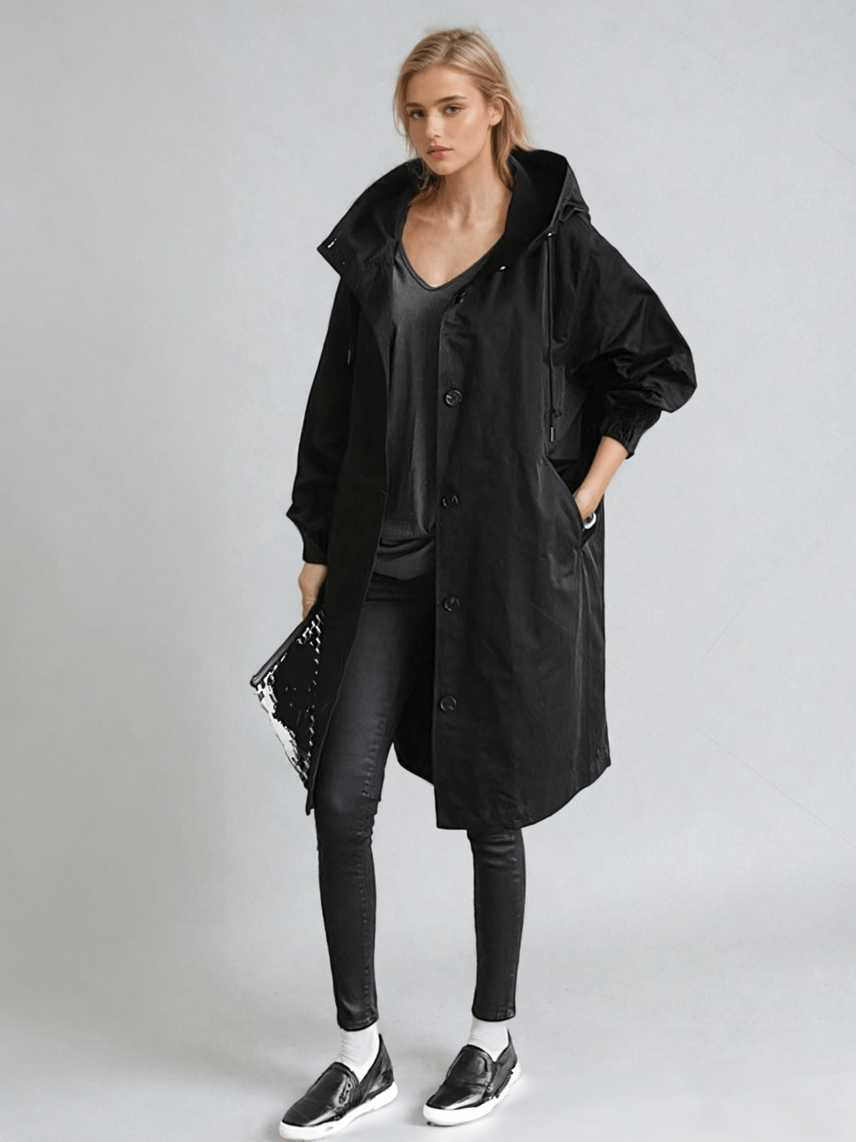 Manteau long chic avec capuche réglable pour un style moderne